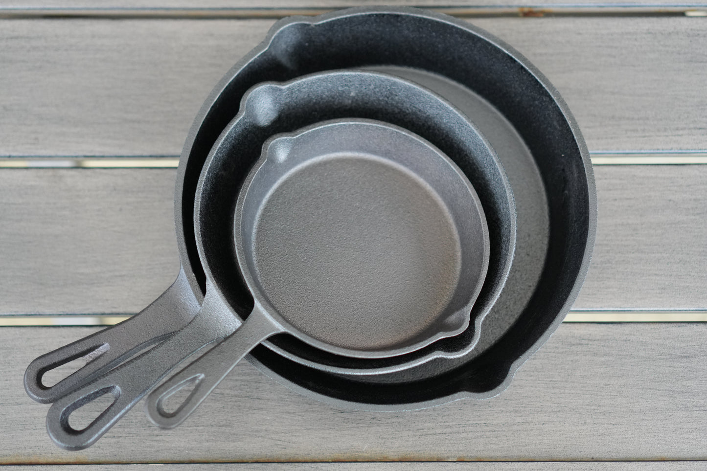 3 piece cast iron fry pan set nested together