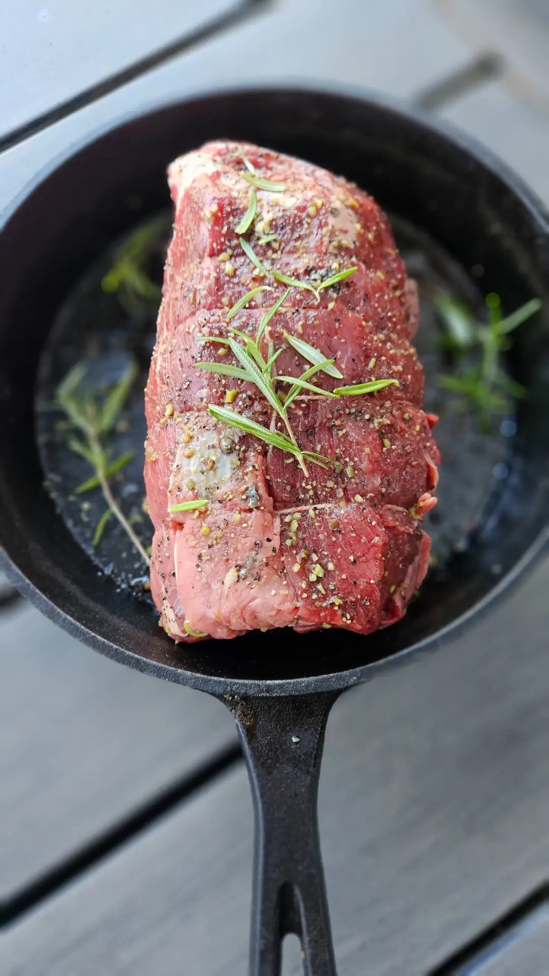 Cast iron pan with roast