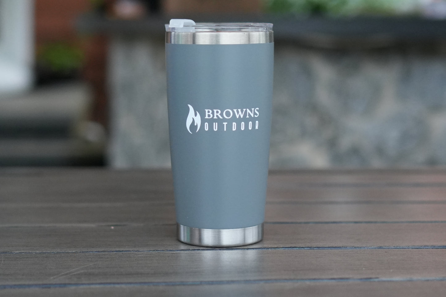 16 oz insulated tumbler in navy by campfire