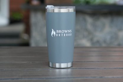 16 oz insulated tumbler in navy by campfire