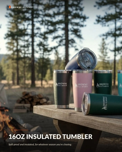 Browns Outpost 16oz insulated tumblers in multiple colours displayed in a wilderness setting. Text at the top reads 'Browns Outpost' and the bottom reads '16OZ INSULATED TUMBLER' with a tagline reading 'Spill-proof and insulated, for whatever season you're chasing.'
